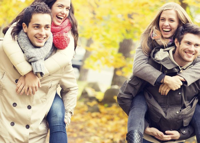 two funny couples on a walk